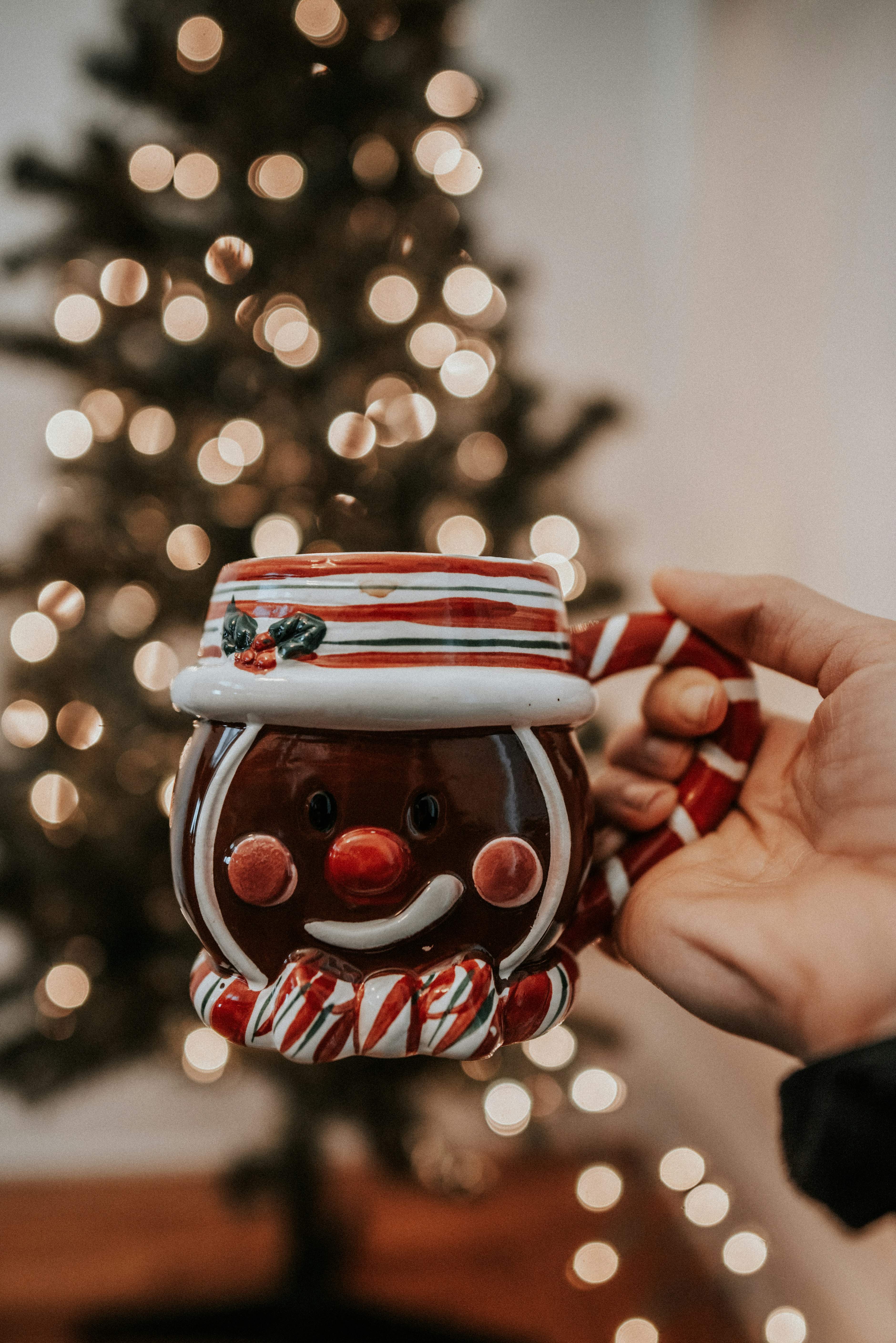 brown and white ginger bread ceramic mug